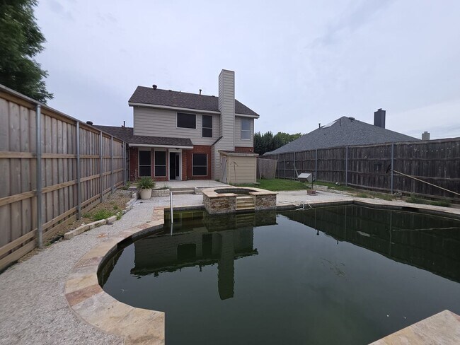 Building Photo - Spacious 4-Bedroom Home with Pool & Spa in...