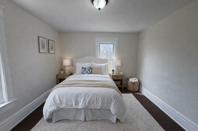 Building Photo - Charming Multi-Level Akron Home with Huge Living Room & Updated Siding