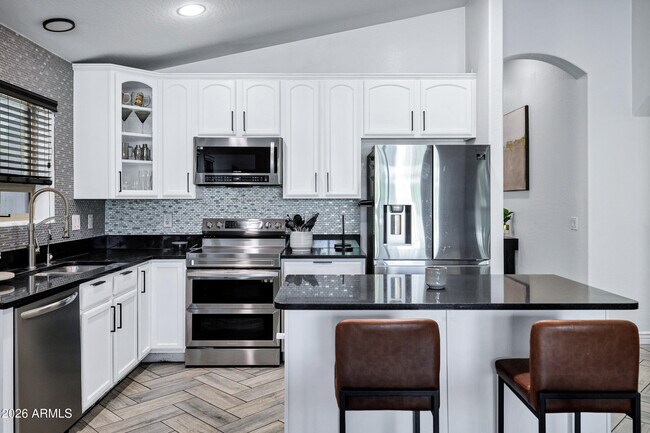 Building Photo - 9558 W Harmony Ln