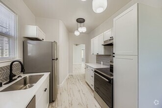 Building Photo - Breathtaking Renovation! Oversized 2 Bed 1...