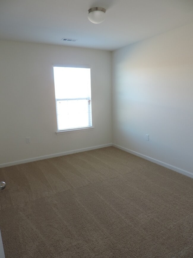 Building Photo - New, 4 bedroom home in the Hallstead commu...