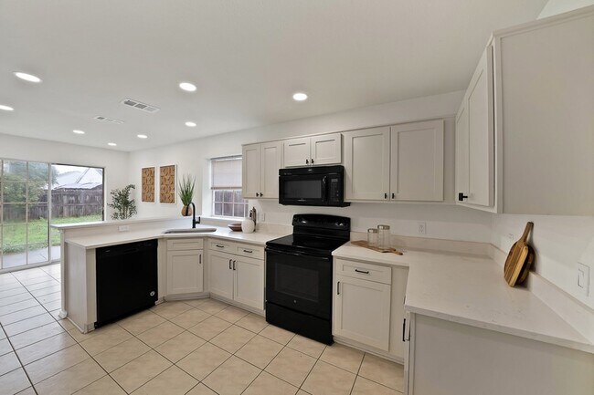 Building Photo - 7548 Meadow Creek Dr