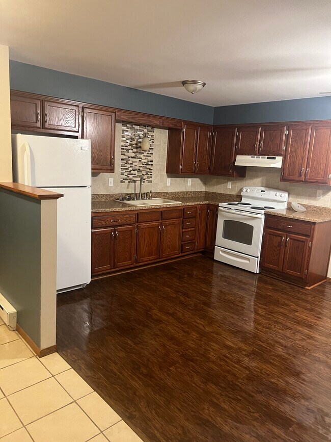 Kitchen, dishwasher being placed before May 1 - 935 Shamrock Ct