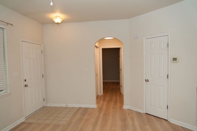 Building Photo - Updated and Bright 2B/2B with Attached Garage Now Available!