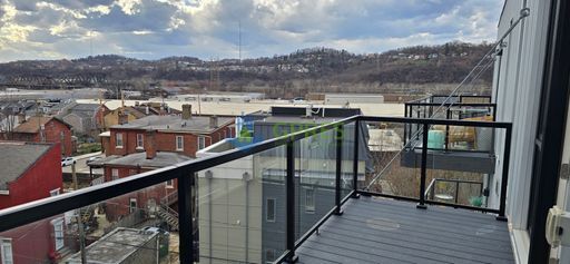 Building Photo - Spacious 2BR/2BA Condo with Fireplace, Balcony & In-Unit Laundry – Pittsburgh