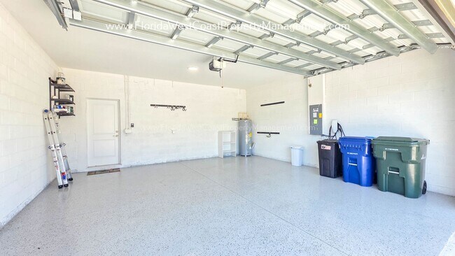 Building Photo - EXCEPTIONAL AND SPACIOUS FURNISHED TOWNHOME WITHIN WATERSIDE- NAUTIQUE!