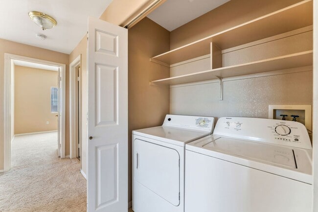 Building Photo - Bright & Stylish Condo with Fireplace and Private Balcony in a Resort-Style Community!