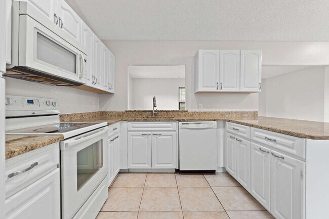 Building Photo - Comfort, Space & Convenience on a Peaceful Corner Lot in the Shores