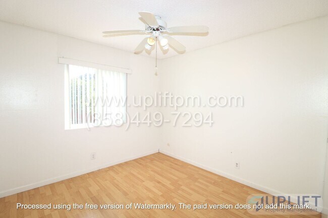 Building Photo - 4 bed, 2 Bath Home With Fenced Yard and attached 2 Car Garage