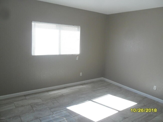 Building Photo - 11509 W Charter Oak Rd