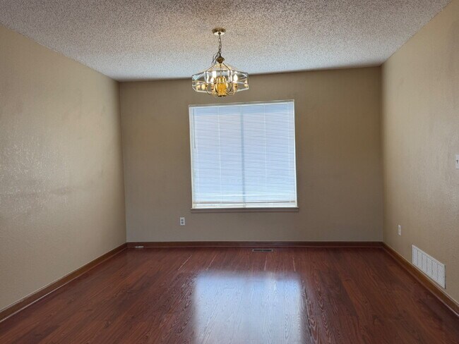 Building Photo - ~Available Now~  Beautiful Four Bedroom Home with Fireplace, Private Yard & Luxurious Primary Suite!