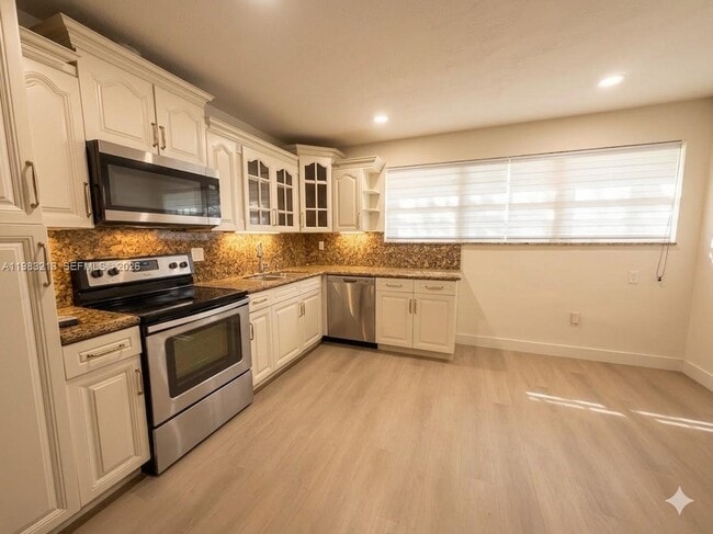 Building Photo - 6885 NW 14th Ct