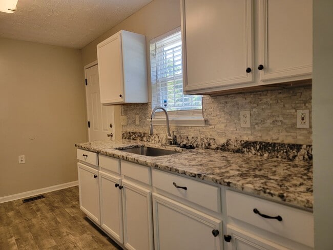 Building Photo - Intown Ranch - ADA Accessible Voucher Appr...