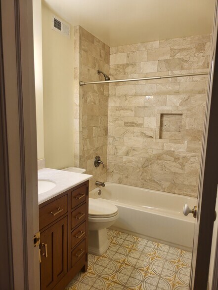 Updated 2nd full bath marble, cement tiles - 2226 Delancey Plz