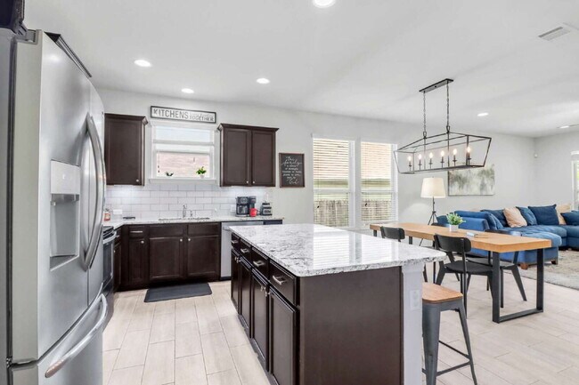 Building Photo - "Charming 3-Bedroom San Antonio Home with Granite Elegance - 1854 Sq Ft of Comfort!"