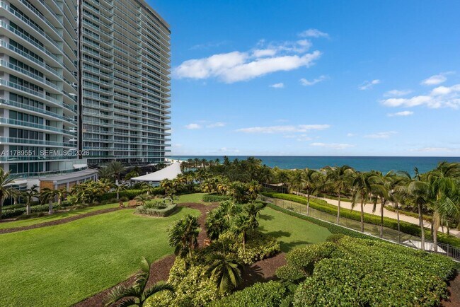 Building Photo - 10275 Collins Ave