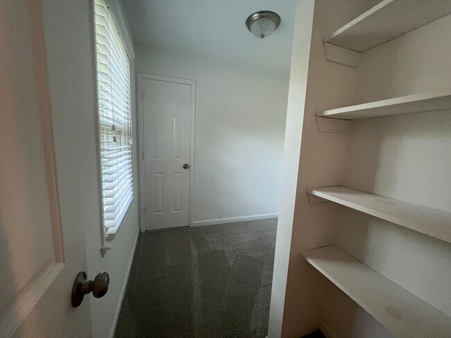 office attached to primary bedroom - 1221 Settlebench Ln NW