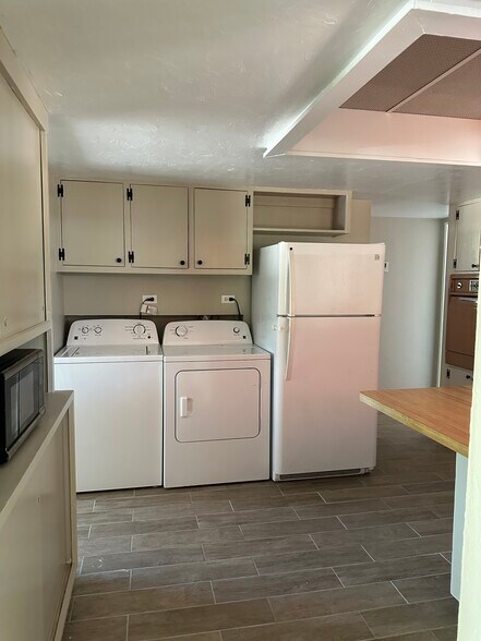 Washer and dryer in kitchen - 1315 E Adams St