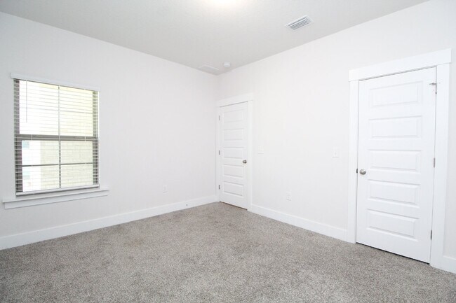 Building Photo - 3BR/2BA Cantonment New Construction Townhome with 2-Car Garage, Granite Kitchen & Low-Maintenance...