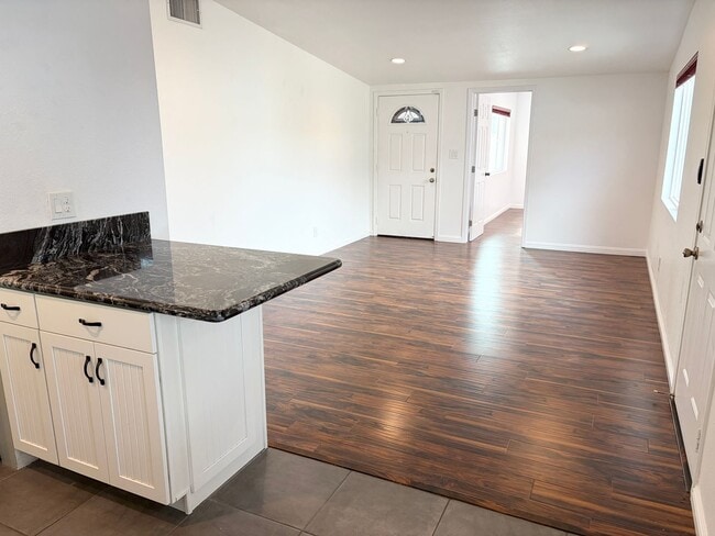 Building Photo - Beautifully Maintained 4-Bedroom Home with Private Backyard