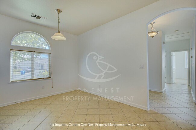 Building Photo - Charming single-story home nestled in the serene Edgewater Community