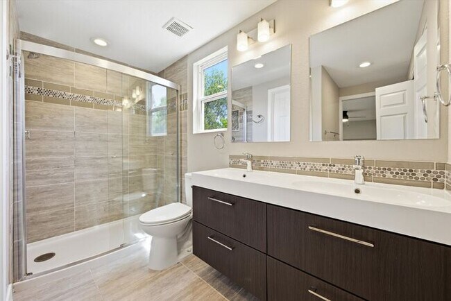 Building Photo - Spacious 4BR Home with Finished Basement, Private Yard & Community Amenities
