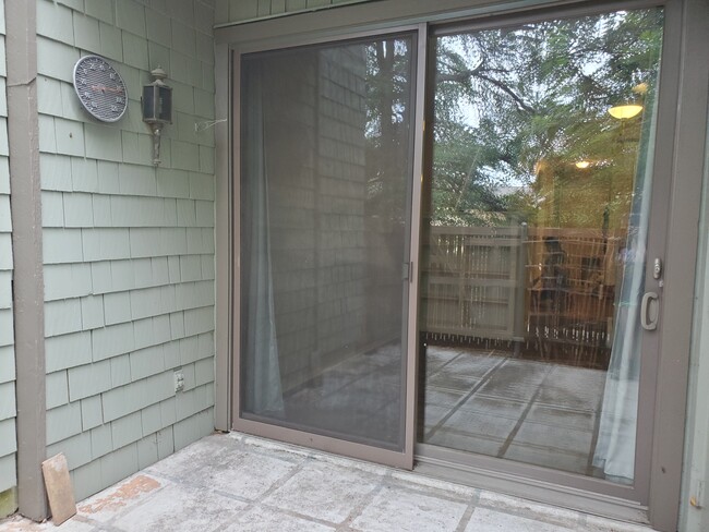 Spacious back porch. - 7122 Wood Hollow Dr