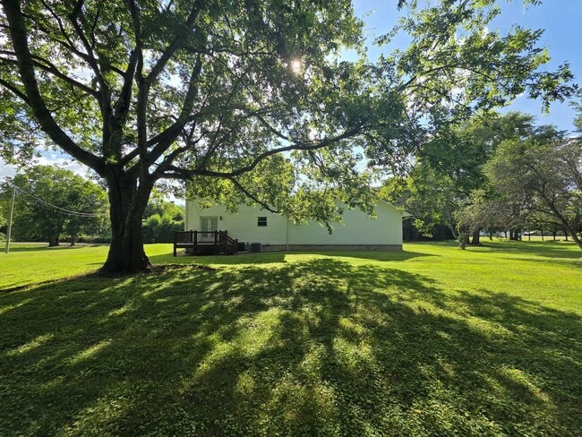 Building Photo - Peaceful Country Living with Modern Updates
