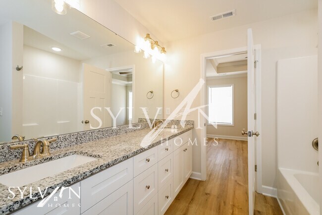 Building Photo - Lease today! No extra charge for contentme...