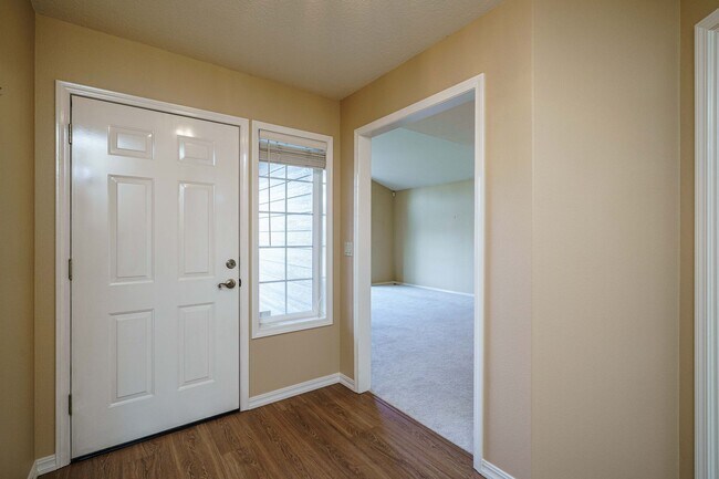 Building Photo - Beautifully Landscaped 1/4 acre with Well Maintained 4 bedroom 2 Bath Home with 3 Car Garage
