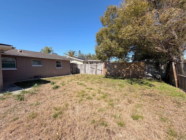 Building Photo - New Port Richey Home with Cozy 970 Sq Ft Layout!