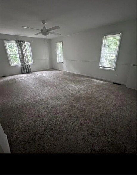 Building Photo - 5197 Woodmont Dr
