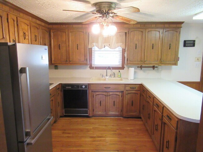 Building Photo - Charming All-Brick Ranch with Finished Bas...