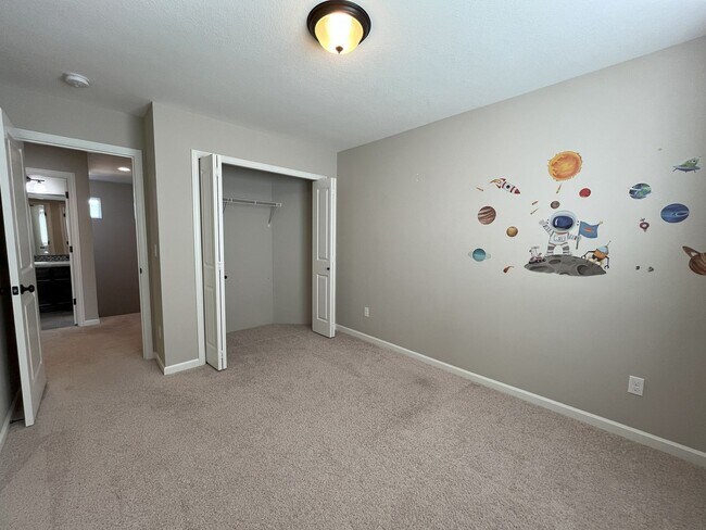 Building Photo - Spacious 4-Bedroom + Bonus Room with Modern Kitchen, Solar Panels & Private Fenced Backyard!