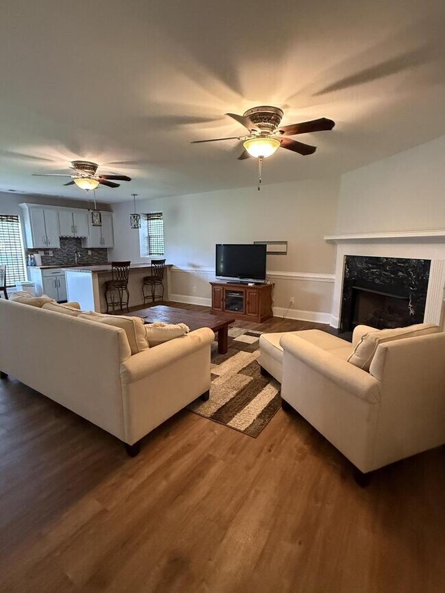 Building Photo - Lake Front Luxury in Chapin!