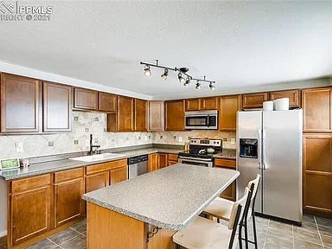 Building Photo - Charming Colorado Springs Home – Spacious ...