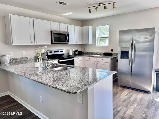 Building Photo - 23 Island Breeze Ln