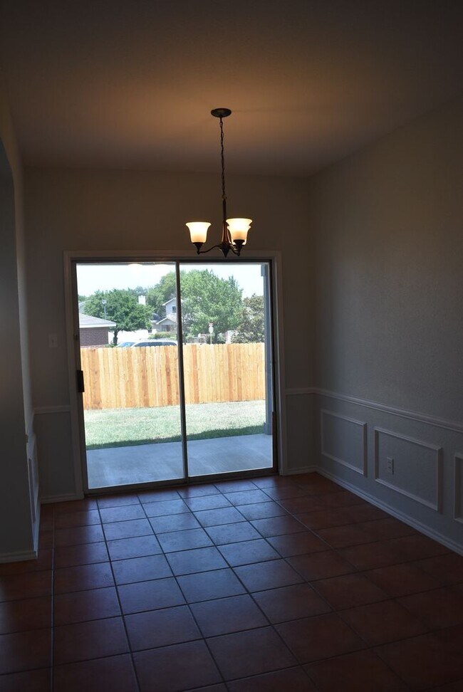 Building Photo - TWO LIVING ROOMS AND TWO DINING ROOMS! Sol...