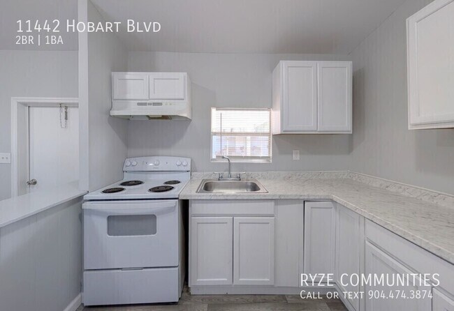 Building Photo - 11442 Hobart Blvd