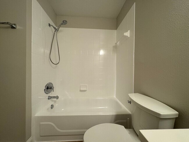 Building Photo - Oviedo 2/2 Condo with Tile & LVP Flooring, Updated Baths, New Paint & Appliances!