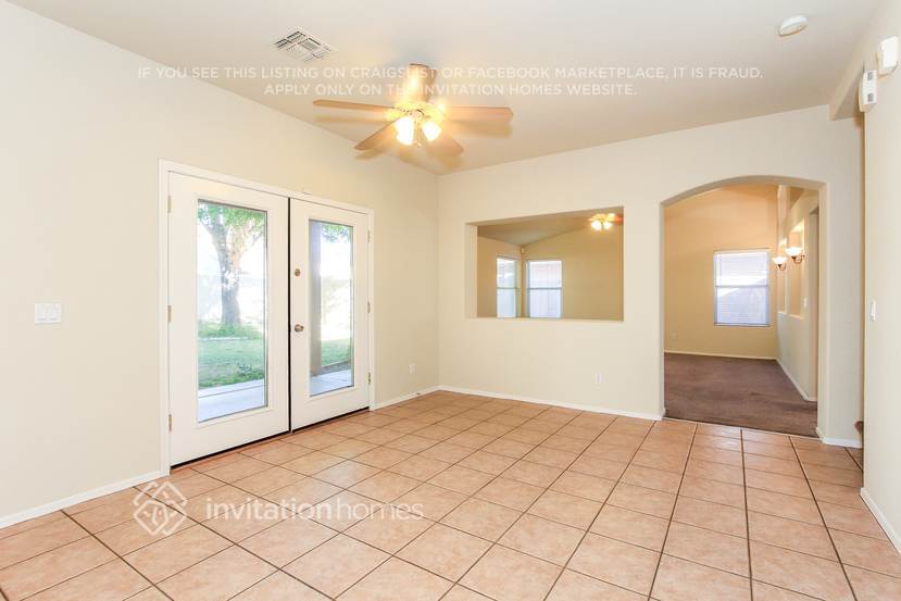 Building Photo - 8228 W Harmony Ln