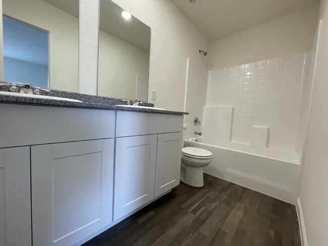 Building Photo - $1,675 rent - Home in gated community with...