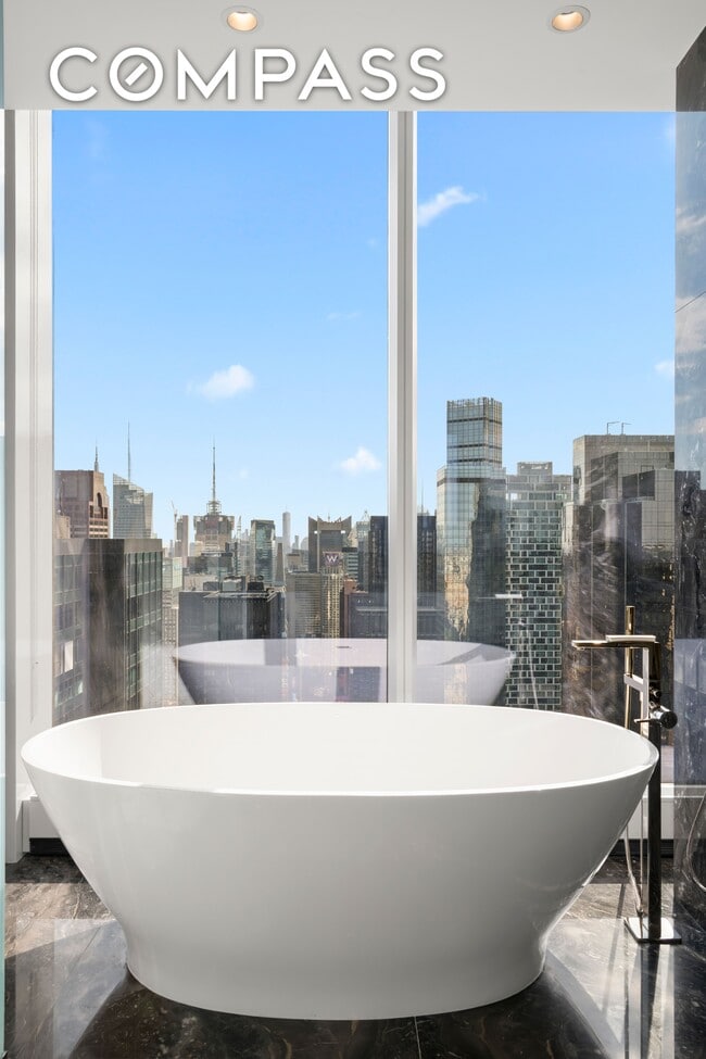 Building Photo - 217 W 57th St