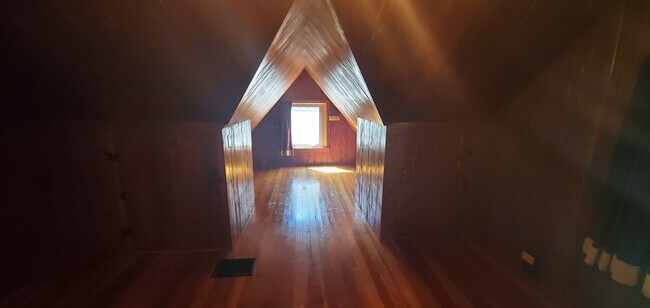 Alternate furnished view showing flexibility for lounging or multi-purpose use. - 2923 Arthur St NE