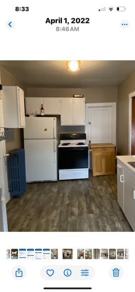 Kitchen with attached pantry. - 810 E Front St
