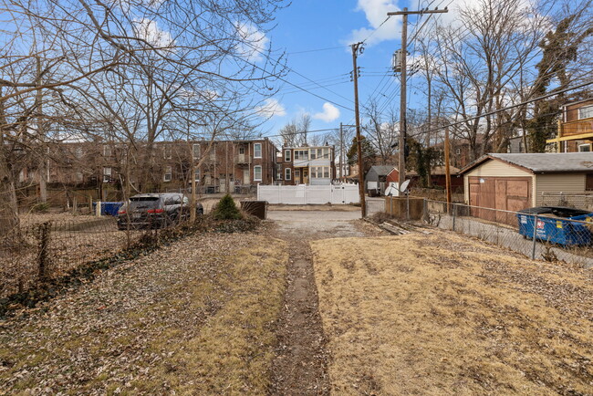 Backyard Parking Pad - 3115 Lackland Ave