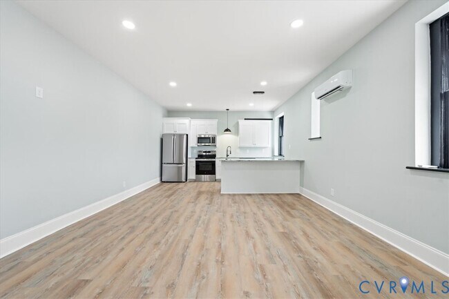 Building Photo - 207 E Broadway