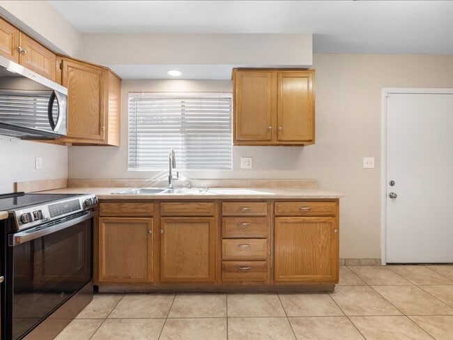 Building Photo - Two-Story Home with Brand New Appliances & Private Turf Backyard!