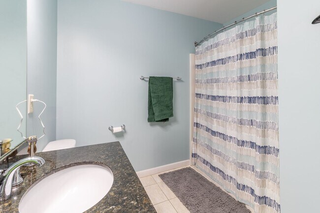 Building Photo - Spacious Luxury Multi Level, 2 Bedroom Condo