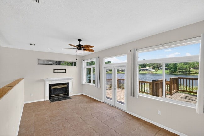 Building Photo - Available Now! Waterfront Living at Its Best – Pool, Decks & Gated Privacy